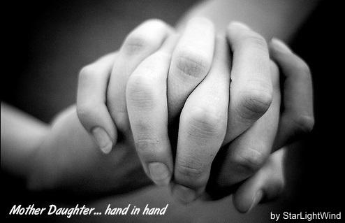 2014-12-23-dec5motherdaughterhandinhand.jpg