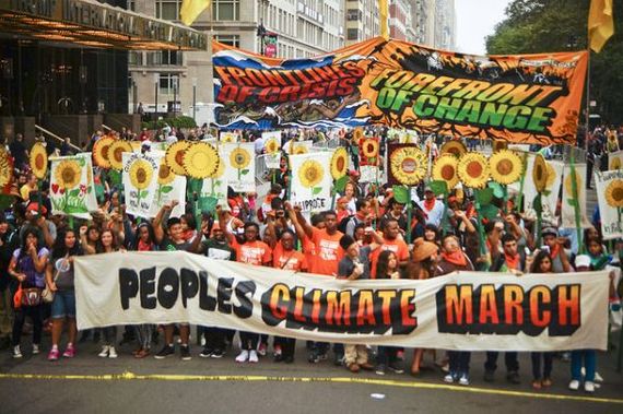 2015-01-05-NewYorkPeoplesClimateMarchcLightBrigading.jpg