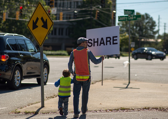 2015-01-28-JoelTauber_ShareSignProtest_cropped_web570.jpg