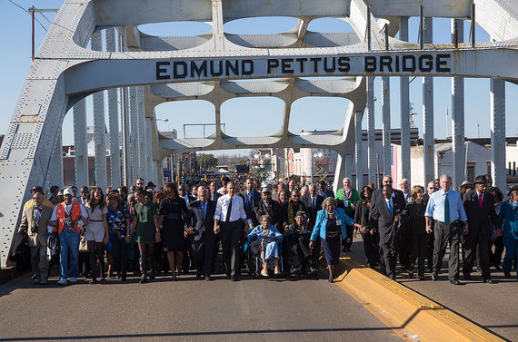 2015-03-17-1426561356-7702141-The_Obamas_and_the_Bushes_continue_across_the_bridge.jpg