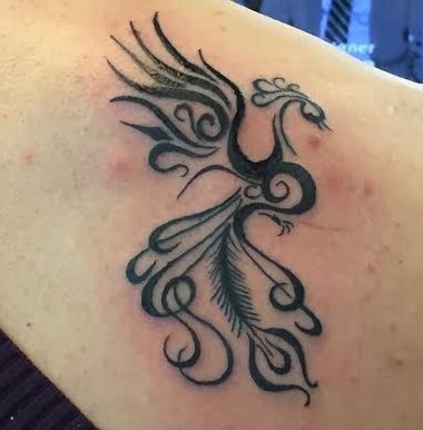 2015-03-20-1426872562-7259766-Amandadivorcetattoo.jpg