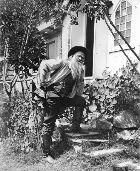 2015-07-19-1437327770-5672109-Portrait_of_Joaquin_Miller_standing_in_front_of_his_home_The_Abbey_in_Oakland_ca.1898.jpg