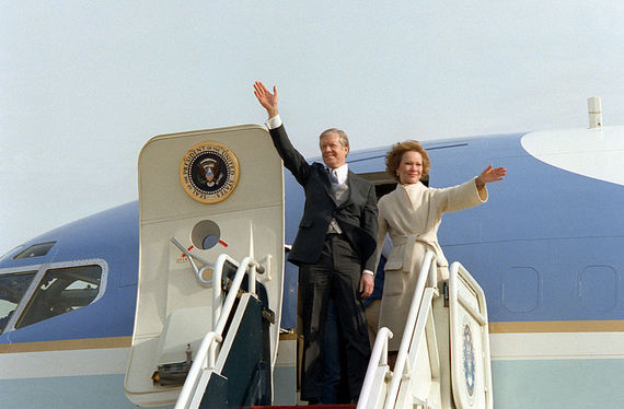 2015-08-22-1440281483-9677012-800pxFormer_President_and_First_Lady_Carter_wave_from_their_aircraft.jpeg