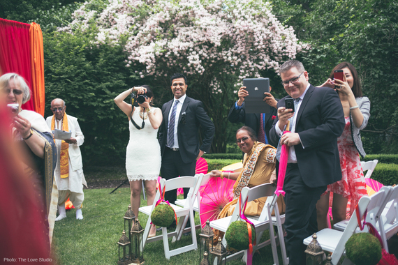 2015-09-04-1441377808-4202821-CellphonesatWeddings_TheLoveStudio002credit.jpg