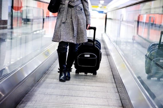 2015-09-18-1442604664-339280-WomanCoatAirport_800px.jpeg