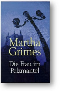 2015-09-27-1443376129-188601-GrimesPelzmantel1.jpg