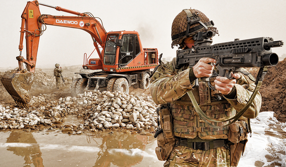 2015-11-13-1447387940-2645345-TalibanSoldier_Keeps_Watch_During_Construction_of_Route_Trident_in_Helmand_Afghanistan_MOD_45152225.jpg