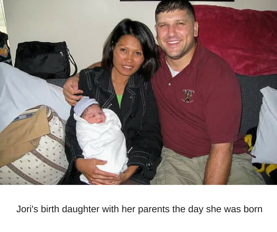 Jori's-birth-daughter-with-her-parents-the-day-she-was-born