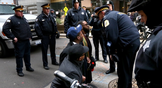 2015-12-02-1449048043-4887301-faceoffwithpolice.png