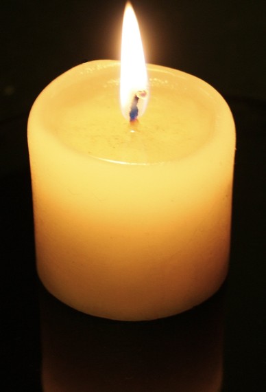 2015-12-07-1449489389-9734619-Candleflameandreflection.jpg