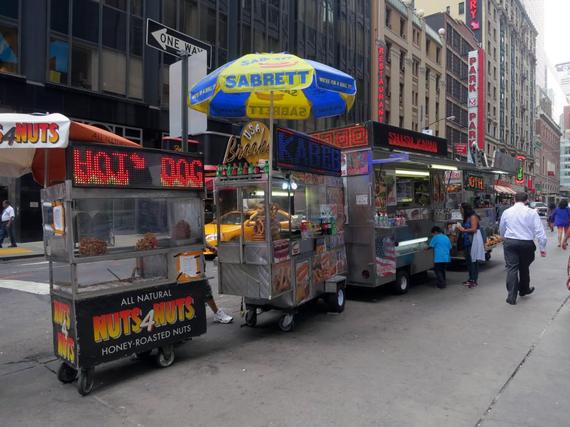 2015-12-16-1450297195-4681383-NYCstreetfood3cartsinrow.jpg