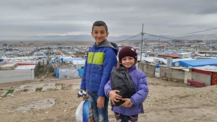 2016-01-10-1452418592-837407-withrefugees.jpg