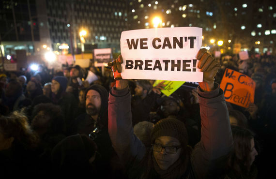 2016-01-26-1453767203-4658644-eric_garner_nypd_protest_ap_img_5.jpg