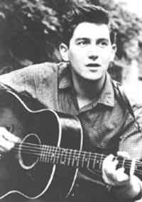 2016-02-29-1456765973-2538002-Phil_Ochs_ca._early_1960s.jpg