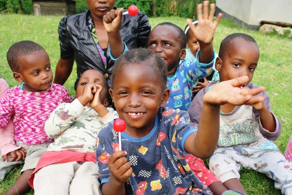 Orphanage children with a mama