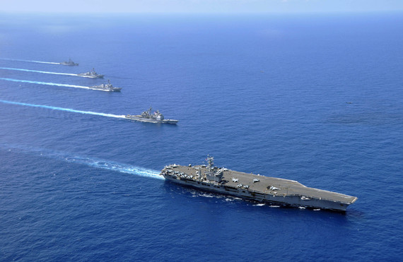 2016-06-10-1465572241-7875276-US_Navy_100215N8421M185_Ships_operate_in_formation_in_the_South_China_Sea.jpg