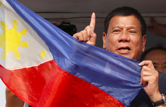 2016-06-12-1465748728-6567519-rodrigodutertedigongphilippines.jpg