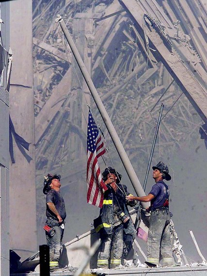 2016-07-18-1468834879-4391542-FiremenRaiseFlag1.jpg