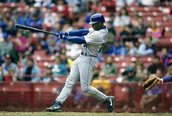 Team USA players watch in awe as MLB-great Ken Griffey Jr. takes