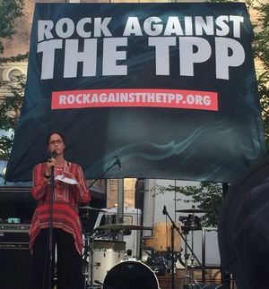 2016-08-23-1471977301-4977148-DanaAtRockAgainstTPP.jpg