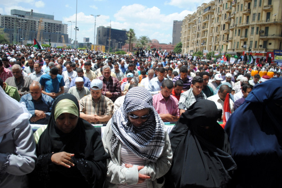 2016-09-12-1473678287-9365499-Friday_prayer_in_Tahrir_Women_Ahead_of_men.jpg