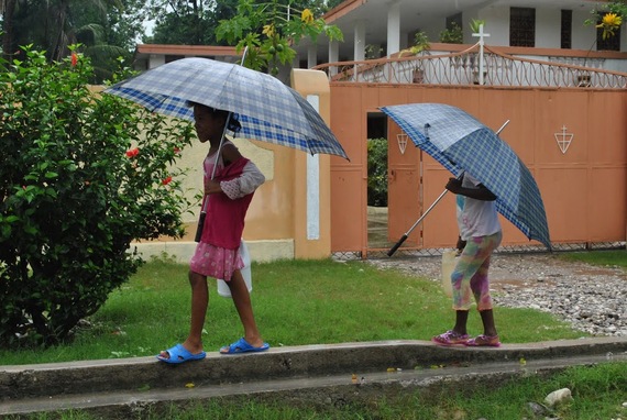 2016-10-09-1476055846-8744779-Haitiumbrellagirls.JPG