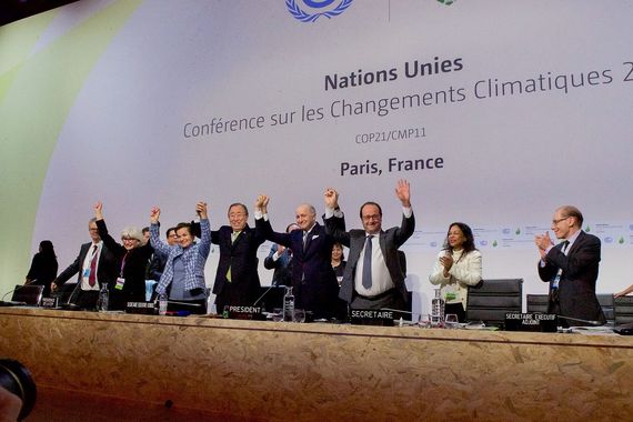 2016-11-11-1478870108-7265842-French_Foreign_Minister_UN_SecretaryGeneral_Ban_and_French_President_Hollande_Raise_Their_Hands_After_Representatives_of_196_Countries_Approved_a_Sweeping_Environmental_Agreement_at_COP21_in_Paris_23076185424.jpg