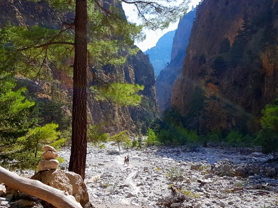 2016-11-28-1480344939-9558604-Hiking_Samaria_Gorge_Crete_8_view_couple_walking.jpg