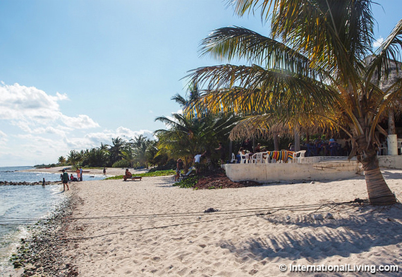 2016-12-12-1481577428-9107917-hpPalmfringedbeachTulumMexico.jpg