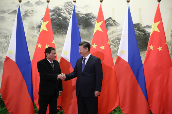 2016-12-19-1482153527-206631-Duterte_handshake_with_President_XiOctober20.jpg