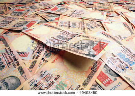 2016-12-22-1482427481-3481003-stockphotobackgroundcreatedwithindianrupeenotes49498450.jpg