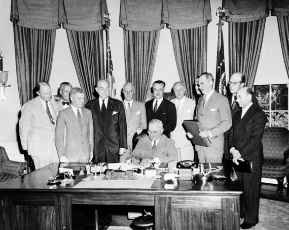 2017-01-06-1483670630-908680-NATOTruman_signing_North_Atlantic_Treaty.jpg