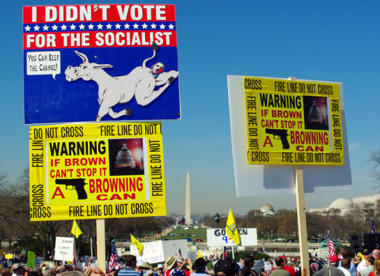 protest signs at anti- Health Care Reform rally