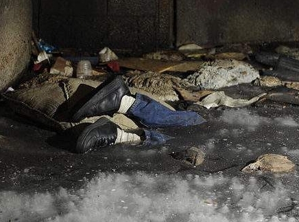 body frozen found ice detroit warehouse block firefighters work